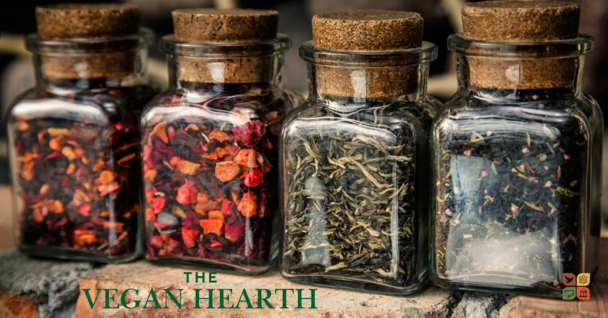 Glass jars filled with dried garden herbs and spices, perfect for seasoning a vegan chili recipe.