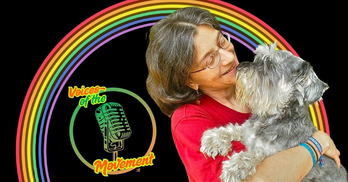Sherry Zitter smiling while holding a dog in a Voices of the Movement feature image